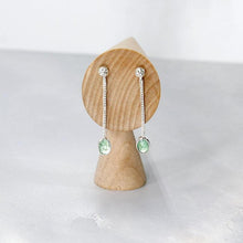 Load image into Gallery viewer, Delicate dangly stud earrings with luminous bezel-set Russian Emeralds hanging on foxtail chain from a hand-textured silver ball.