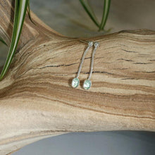 Load image into Gallery viewer, Delicate dangly stud earrings with luminous bezel-set Russian Emeralds hanging on foxtail chain from a hand-textured silver ball.