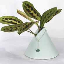 Load image into Gallery viewer, A rich green raw emerald dangles from a tiny glowing labradorite. This y-shaped necklace is perfect for deep necklines and adding the perfect amount of color without overwhelming your look!