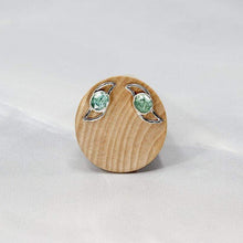 Load image into Gallery viewer, These small but striking stud earrings are sure to get lots of attention! Unusually light minty-green, the rose-cut Russian Emeralds have a delightful gemmy sparkle that is framed by lightly hammered silver wings