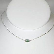 Load image into Gallery viewer, The Evie necklace brings the perfect tiny highlight to your look. The lovely mint-green rosecut Russian Emerald is nestled in a delicate diamond-cut sterling silver chain for extra sparkle.
