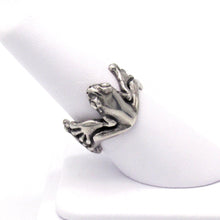 Load image into Gallery viewer, This adorable little tree frog clings to your finger with oversized toes, happy to bring a shine to your hand and a smile to your face! Looking like it just hopped out of a silver rainforest, your new Morelets Tree Frog ring will add a bit of bounce to your look!  We donate a portion of all WildWhere sales to support continuing wildlife conservation efforts!