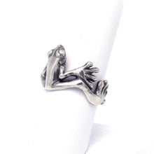 Load image into Gallery viewer, This adorable little tree frog clings to your finger with oversized toes, happy to bring a shine to your hand and a smile to your face! Looking like it just hopped out of a silver rainforest, your new Morelets Tree Frog ring will add a bit of bounce to your look!  We donate a portion of all WildWhere sales to support continuing wildlife conservation efforts!