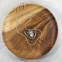 Load image into Gallery viewer, Faye features delicate handcrafted wings to frame this necklace’s substantial eye-catching Green Opal. A beautiful spring green, the stone is striped with shimmering bands and accented by a tiny drop of yellow-green labradorite.