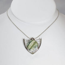 Load image into Gallery viewer, Faye features delicate handcrafted wings to frame this necklace’s substantial eye-catching Green Opal. A beautiful spring green, the stone is striped with shimmering bands and accented by a tiny drop of yellow-green labradorite.