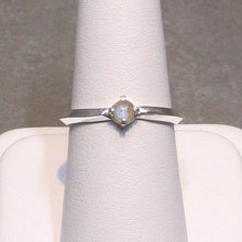 Load image into Gallery viewer, A tiny 3-mm Labradorite set in a delicate 4-prong setting on a solid Sterling Silver knife-edge band. The inside of the band is rounded for a comfortable fit.  A comfortable, easy-wearing band with a touch of shimmer, perfect for stacking with other rings or alone for a classic look