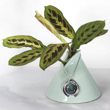 Load image into Gallery viewer, One part portal and one part shield talisman, this aqua blue Labradorite Deidra is all sleek elegance and high shine.     Details:  Solid sterling silver, partially recycled  Natural Labradorite cabochon  Pendant: 30 x 27mm  18” long Sterling Silver chain plus 2” Extender  Handmade s-hook clasp