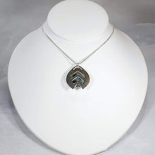 Load image into Gallery viewer, One part sci-fi portal and one part shield talisman, this aqua blue Labradorite Deidra is all sleek elegance and high shine.
