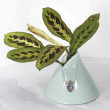 Load image into Gallery viewer, With its curling vines and hand textured petal, the Fleur necklace adds a touch of romance to your look. The checker cut Lilac Chalcedony has a soft purple glow and just the right amount of sparkle.