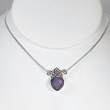 Load image into Gallery viewer, With its curling vines and hand textured petal, the Fleur necklace adds a touch of romance to your look. The checker cut Lilac Chalcedony has a soft purple glow and just the right amount of sparkle.
