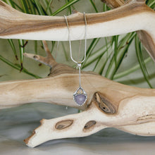 Load image into Gallery viewer, Eloise is a charming y-shaped necklace with a lovely faceted Lilac Chalcedony. Hand carved texture balances out the geometric shapes framing the stone.