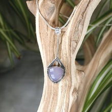 Load image into Gallery viewer, Eloise is a charming y-shaped necklace with a lovely faceted Lilac Chalcedony. Hand carved texture balances out the geometric shapes framing the stone.