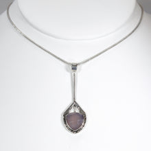 Load image into Gallery viewer, Eloise is a charming y-shaped necklace with a lovely faceted Lilac Chalcedony. Hand carved texture balances out the geometric shapes framing the stone.