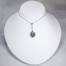 Load image into Gallery viewer, Eloise is a charming y-shaped necklace with a lovely faceted Lilac Chalcedony. Hand carved texture balances out the geometric shapes framing the stone.