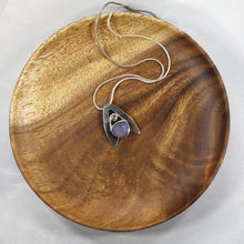 Load image into Gallery viewer, Sleek and polished, the Lilian features a dreamy checker cut Lilac Chalcedony crowned by a soft peachy drop of Labradorite. Smooth wings curve back to seamlessly form a bail that slides along a finely woven foxtail chain.