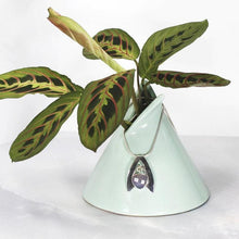 Load image into Gallery viewer, Sleek and polished, the Lilian features a dreamy checker cut Lilac Chalcedony crowned by a soft peachy drop of Labradorite. Smooth wings curve back to seamlessly form a bail that slides along a finely woven foxtail chain.