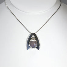 Load image into Gallery viewer, Sleek and polished, the Lilian features a dreamy checker cut Lilac Chalcedony crowned by a soft peachy drop of Labradorite. Smooth wings curve back to seamlessly form a bail that slides along a finely woven foxtail chain.