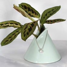 Load image into Gallery viewer, This Rainbow Moonstone choker is for someone who wants an especially close-fitting necklace. At just 15” long, the sterling silver wheat chain allows the pale green and aqua moonstone to rest right at the base of the throat.