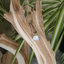 Load image into Gallery viewer, This Rainbow Moonstone choker is for someone who wants an especially close-fitting necklace. At just 15” long, the sterling silver wheat chain allows the pale green and aqua moonstone to rest right at the base of the throat.