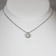 Load image into Gallery viewer, This Rainbow Moonstone choker is for someone who wants an especially close-fitting necklace. At just 15” long, the sterling silver wheat chain allows the pale green and aqua moonstone to rest right at the base of the throat.