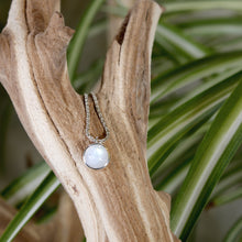 Load image into Gallery viewer, This 9mm Luna necklace features a beautiful round Rainbow Moonstone simply set in a smooth silver bezel. A simple oval chain completes the clean, classic look you will find yourself wearing over and over.