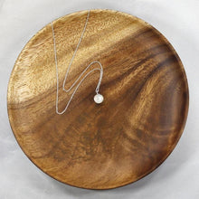Load image into Gallery viewer, This 9mm Luna necklace features a beautiful round Rainbow Moonstone simply set in a smooth silver bezel. A simple oval chain completes the clean, classic look you will find yourself wearing over and over.