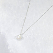 Load image into Gallery viewer, This 9mm Luna necklace features a beautiful round Rainbow Moonstone simply set in a smooth silver bezel. A simple oval chain completes the clean, classic look you will find yourself wearing over and over.