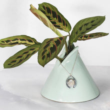 Load image into Gallery viewer, One part portal and one part shield talisman, this aqua blue Labradorite Deidra is all sleek elegance and high shine. Details: Solid sterling silver, partially recycled Natural Labradorite cabochon Pendant: 30 x 27mm 18” long Sterling Silver chain plus 2” Extender Handmade s-hook clasp