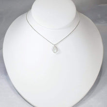 Load image into Gallery viewer, Simple and sweet, the Tess moonstone necklace is a jewel you will reach for over and over. A beautiful blue flash in the cloud-white stone set in a classic silver bezel adds the perfect touch of glam to this easy to wear necklace.