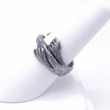 Load image into Gallery viewer, This snuggly silver Sea Otter curls his paws and tail around you finger in a tiny hug!   We donate a portion of all WildWhere sales to support continuing wildlife conservation efforts!