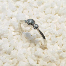Load image into Gallery viewer, Our Pebbles line are the perfect easy-wearing pieces for everyday wear (I have been wearing my pebble rings 24/7 for years, even when I’m working on other jewelry!). Slim bands and low-profile details are comfortable, and solid Sterling Silver construction with no gems makes them durable enough for most daily life.