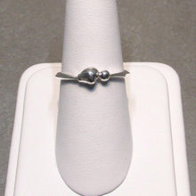 Load image into Gallery viewer, Our Pebbles line are the perfect easy-wearing pieces for everyday wear (I have been wearing my pebble rings 24/7 for years, even when I’m working on other jewelry!). Slim bands and low-profile details are comfortable, and solid Sterling Silver construction with no gems makes them durable enough for most daily life.