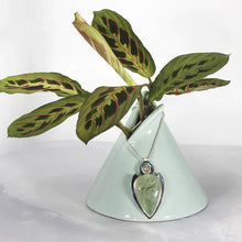 Load image into Gallery viewer, The Jeryn necklace is an absolute showstopper. Featuring a large translucent pear green Prehnite with black tourmaline inclusions, the spearhead shaped pendant is topped off with a luminous peachy green Labradorite set in a hand-texture bezel. A strong and elegant wheat chain balances the piece out and a 2” extension chain allows for neckline options.