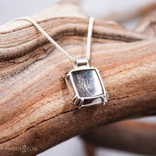 Load image into Gallery viewer, A glamorous Dendritic Quartz held by 8 tapered prongs is capped with a flush set Black Spinel and slides on a sleek silver wheat chain  Solid sterling silver, partially recycled  Dendritic Quartz, Black Spinel  Pendant: 17mm x 22mm  16" Sterling chain, adjustable to 18"  Lobster claw clasp