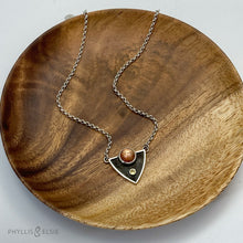 Load image into Gallery viewer, A shimmering Sunstone rises through the thick silver frame of its shadowbox. A faceted golden Topaz adds even more color and sparkle to this striking pendant.  Details:  Solid sterling silver, partially recycled  Dendritic Quartz  Pendant: 28mm x 23mm  18” long Sterling Silver chain plus 2" extension  Lobster-claw clasp