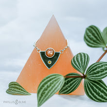 Load image into Gallery viewer, A shimmering Sunstone rises through the thick silver frame of its shadowbox. A faceted golden Topaz adds even more color and sparkle to this striking pendant.  Details  Solid sterling silver, partially recycled  Sunstone & Golden Topaz  Pendant: 28mm x 23mm  18” long Sterling Silver chain plus 2" extension  Lobster-claw clasp