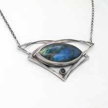 Load image into Gallery viewer, This striking necklace features a stunning deep blue and aqua labradorite marquise cabochon framed by layered silver wings and a demure jade gem. The 16” chain lets the pendant land just below the collarbone. The .925 Sterling silver surround has an oxidized and antiqued finish, giving this piece the look of an heirloom treasure with a story to tell.