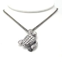 Load image into Gallery viewer, Handmade .925 Sterling silver Loggerhead Sea Turtle pendant on .925 Sterling wheat chain with a lobster clasp  We donate a portion of all WildWhere sales to support continuing wildlife conservation efforts!