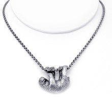 Load image into Gallery viewer, Our charming Three-Toed Sloth hangs happily from a lovely wheat chain, happy to watch the world from a safe perch around your neck! With life-like detail and cuteness to spare, your new silver pal is sure to draw lots of compliments!  We donate a portion of all WildWhere sales to support continuing wildlife conservation efforts!