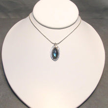 Load image into Gallery viewer, Our Daphne necklaces all feature a stunning deep blue marquise cut Labradorites. This royal hue is one of the most desired shades of the stone and looks stunning set in silver.  This Daphne  is set in a sleek shadowbox with hand-carved notches that reference an Art-Deco aesthetic. A simple arched bail provides a sleek connection to a smooth, round, foxtail chain.
