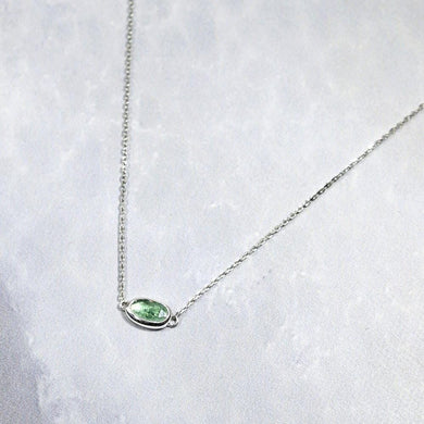 The Evie necklace brings the perfect tiny highlight to your look. The lovely mint-green rosecut Russian Emerald is nestled in a delicate diamond-cut sterling silver chain for extra sparkle. 