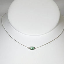 Load image into Gallery viewer, The Evie necklace brings the perfect tiny highlight to your look. The lovely mint-green rosecut Russian Emerald is nestled in a delicate diamond-cut sterling silver chain for extra sparkle. 

