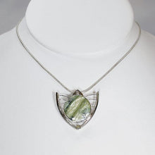 Load image into Gallery viewer, Faye features delicate handcrafted wings to frame this necklace’s substantial eye-catching Green Opal. A beautiful spring green, the stone is striped with shimmering bands and accented by a tiny drop of yellow-green labradorite.
