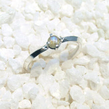 Load image into Gallery viewer, A tiny 3-mm Labradorite set in a delicate 4-prong setting on a solid Sterling Silver knife-edge band. The inside of the band is rounded for a comfortable fit.  A comfortable, easy-wearing band with a touch of shimmer, perfect for stacking with other rings or alone for a classic look
