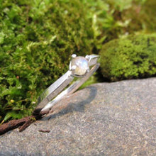 Load image into Gallery viewer, A tiny 3-mm Labradorite set in a delicate 4-prong setting on a solid Sterling Silver knife-edge band. The inside of the band is rounded for a comfortable fit.  A comfortable, easy-wearing band with a touch of shimmer, perfect for stacking with other rings or alone for a classic look
