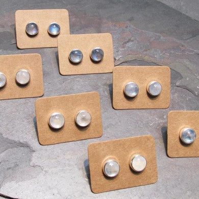 These sweet little studs feature ethically sourced rainbow moonstones set in a simple recycled silver bezel. At 9mm wide, they are the perfect size for everyday wear while still adding a flash of shimmer to your look! Solid sterling studs and surgical steel butterfly backings provide a secure fit for sensitive skin. These moondrops come in a range of colours from pearly white to twilight blue so you can pick your perfect pair!