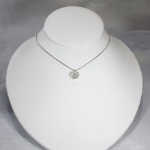 Load image into Gallery viewer, This 11mm Luna necklace features a beautiful round Rainbow Moonstone simply set in a smooth silver bezel. A silver wheat chain completes the clean, classic look you will find yourself wearing over and over.
