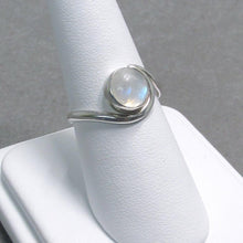 Load image into Gallery viewer, A perfect match for our Luna stud earrings, this ring holds a gorgeous iridescent Moonstone is wrapped in a cresting silver wave. 
