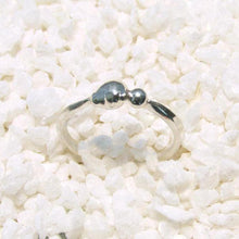 Load image into Gallery viewer, Our Pebbles line are the perfect easy-wearing pieces for everyday wear (I have been wearing my pebble rings 24/7 for years, even when I’m working on other jewelry!). Slim bands and low-profile details are comfortable, and solid Sterling Silver construction with no gems makes them durable enough for most daily life. 

