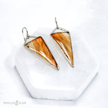Load image into Gallery viewer, Bold and beautiful matching slices of Montana Agate set in sterling silver bezels with open backs to let the sun shine through.   Details:  Solid sterling silver, partially recycled  Montana Agate  Earring faces: 18mm x 42mm  Sterling silver ear hooks
